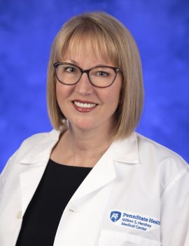 Headshot of Dr. Jessyka Lighthall wearing a white coat.
